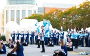 A group of marching band students perform. 