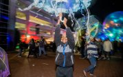 Savanna Baltero of Tidewater Blues leads a jellyfish dance with children and parents during Bubble Fest.