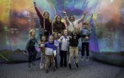 Parents pose with their children for group photos in the middle of the colorful bubbles during Bubble Fest.