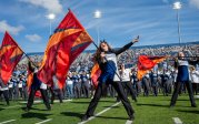 ODU's color guard performs on the football field.