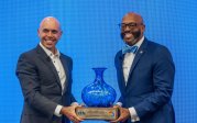 Old Dominion University President Brian O. Hemphill, Ph.D., presents Matthew Schneider, managing director, National, U.S. State, Local and Education for Google, with a “convergence sphere,” a glass artwork symbolic of the partnership’s fusion of knowledge and technology.