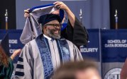 A student is hooded.