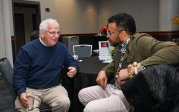 Joel Rubin (left) and Rev. Dr. Antipas Harris have a conversation during Old Dominion University’s 41st annual Martin Luther King Jr. Observance on January 29 in the Big Blue Room at Chartway Arena. 
