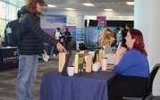 Student visiting booth at library
