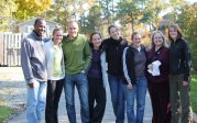 Group of residents standing on path at retreat. 