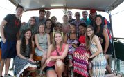 Group of new interns on boat. 
