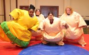Residents in sumo suits. 