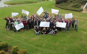Residents at group retreat on golf course. 