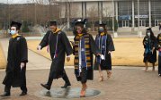 Old Dominion University's commencement exercises are filled with inspiration and moments of joy as graduates walk across the seal on Kaufman Mall. Photo Chuck Thomas/ODU