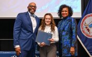 President Brian O. Hemphill and Vice President September Sanderlin with Monarch Values Award winner Andrea Fore at the Monarch Milestones Celebration on April 10, 2025.