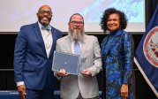 President Brian O. Hemphill and Vice President September Sanderlin with Monarch Values Award winner David Hawkins at the Monarch Milestones Celebration on April 10, 2025.