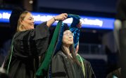 A student is hooded.