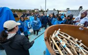 Students and staff on board an oyster barge.
