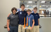 A.P.S. Team – Lucas, Caleb, William, and Owen with their rockets.