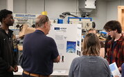 ATMOS team presenting their research.