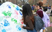 Students place handprints on Dominion Rock on March 23 and March 24 to honor and pay respect to Lt. Col. Brandon Shah (B.S. ’07).