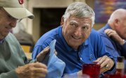 ODU alumni Jim Witcher and Billy Goodson Jr. sit at a lunch table. 
