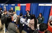 A crowd of students gathered at a career information fair.