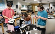 Presenters from Paradise Creek Nature Park offered interactive learning experiences, including viewing specimens under a microscope.
