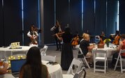 Ellmer College of Health Sciences with the Strolling Strings