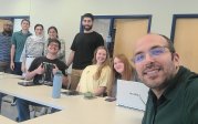 Group of students relaxing after a meeting.