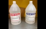 Two different containers of EtOH. One bottle has a red label that says 190 proof Ethanol. The other bottle has a blue label that says 200 proof pure Ethanol.