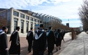 Graduates walk to Chartway Arena