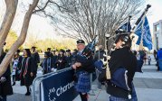 Bagpipers play as students enter Chartway