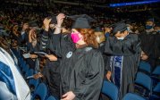 An ODU rite of passage is moving the tassel from the right side of the mortarboard to the left. Photo Chuck Thomas/ODU