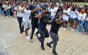 The brothers of Alpha Phi Alpha, Inc., take their turn step dancing on Kaufman Mall. Photo Chuck Thomas/ODU