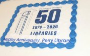 library 50th anniversary logo on a cake