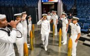 Navy personnel march into Chartway Arena