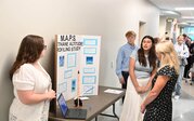 M.A.P.S. team presenting their research.