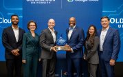 Representatives from Google and Old Dominion University celebrate the first-of-its-kind partnership to launch MonarchSphere, an AI incubator powered by Google Cloud. The University hosted a campus and community celebration on Oct. 30 in the Big Blue Room at Chartway Arena.