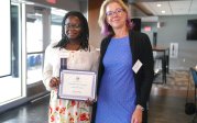 person accepting award and posing