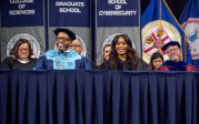 President Brian O. Hemphill, Ph.D., and Award-winning actress Angela Bassett watches the graduates enter Chartway Arena during Old Dominion University's commencement exercises on May 6. Photo Chuck Thomas/ODU