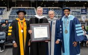From left to right: Provost and Vice President for Academic Affairs Austin Agho, Del. Barry Knight, Board of Visitors Rector Bruce Bradley and President Brian O. Hemphill, Ph.D. pose for a photograph after Knight received an honorary doctorate during Saturday’s undergraduate Commencement exercise.
