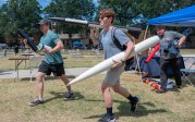 Students holding rockets on Kaufman Mall on ODU's campus.