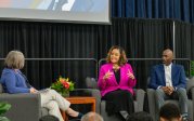 Jennell Whitfield Riddick, Ph.D. (center) speaks to Master of Ceremonies Cathy Lewis, while Dwight S. Riddick II, Ph.D., listens on at Old Dominion University’s 41st Annual Martin Luther King Jr. Observance on January 29.
