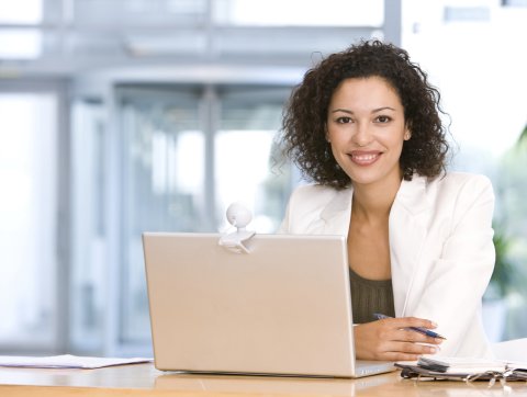 Curriculum Woman at Laptop