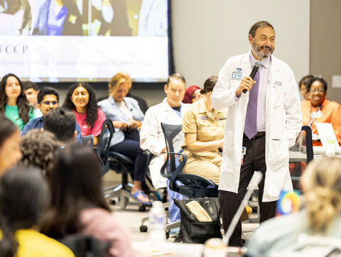 Doctor speaking to residents