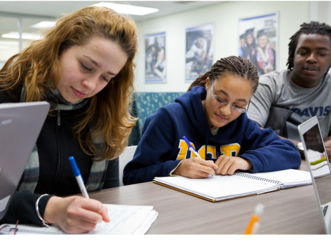 3 students write and study in the STC