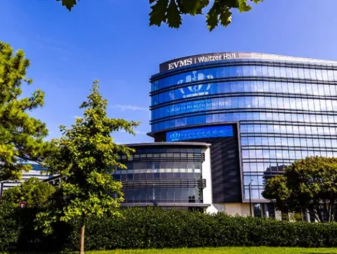 Waitzer hall is a multi-story building with mirrored walls a