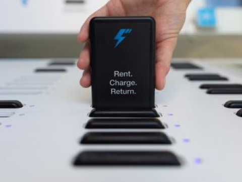 Charger being removed by hand
