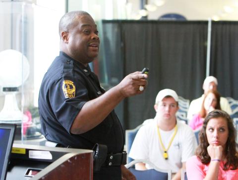 Officer presents wellness and safety at New Student Orientat