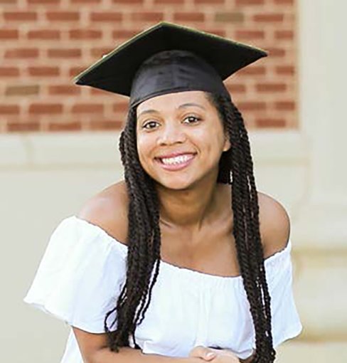 Kimberly Jackson poses for a graduation photo