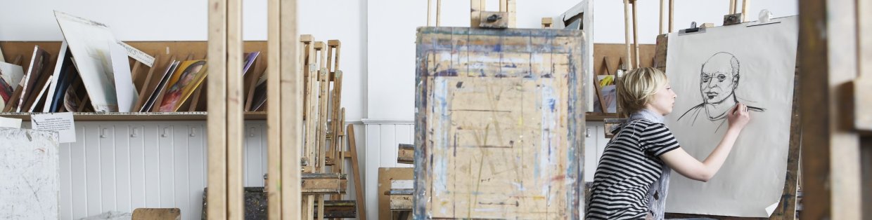 An artist sketching a portrait. 