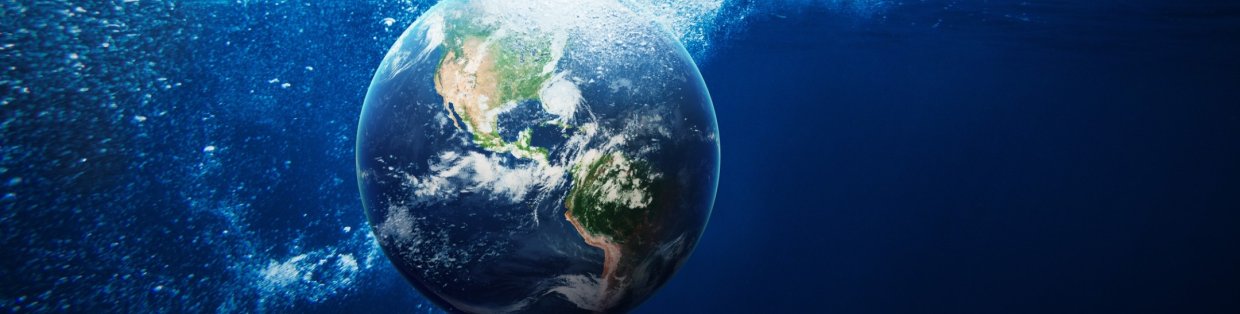 A globe being dropped into water.