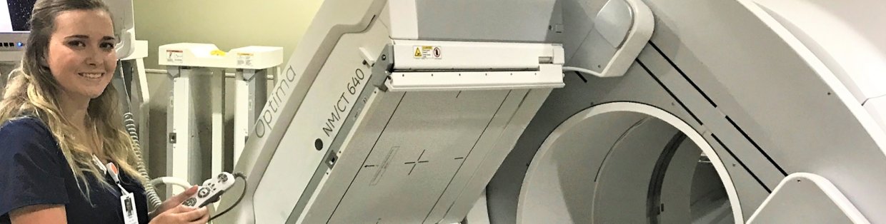 A technician demonstrating an mri machine. 
