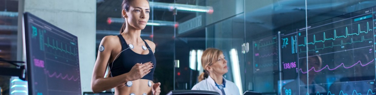A woman running on a treadmill.